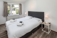 Chalet aan de kust met tuin