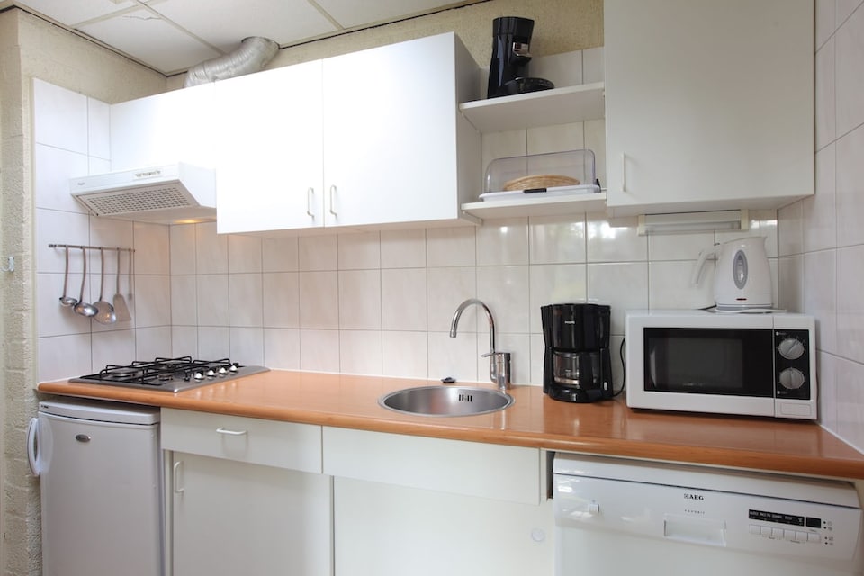 Bungalow en la ladera con jardín, Schin op Geul