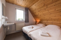 Rustiek-chique villa met rieten dak