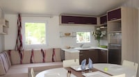 Mobilhome in Bessan met terras