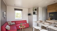 Mobilhome in Bessan met terras