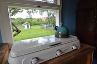 Pipowagen in Weideblick met Boerderijdieren