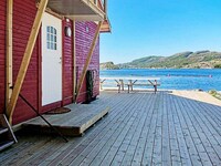 8 person holiday home in Revsnes