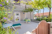 Studio-appartement met terras met uitzicht op zee