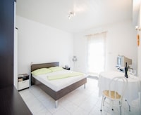 Studio-appartement met terras met uitzicht op zee
