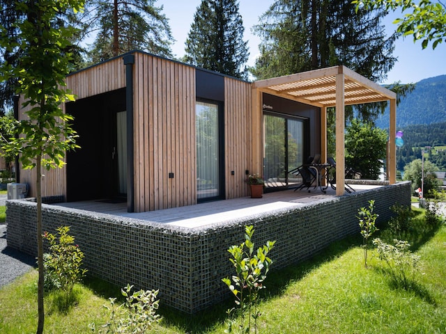 Confortevole chalet vicino al lago Pressegger See