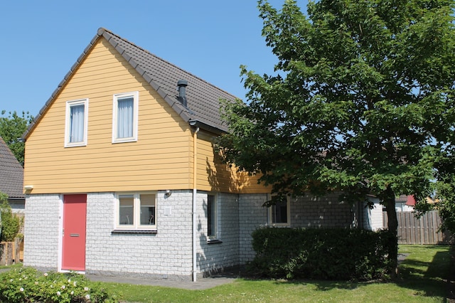 Vakantiehuis in rustige park met tuin
