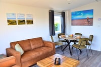 Mooi chalet tussen golfbaan en strand
