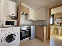 Appartement bij strand met zwembaden Spanje
