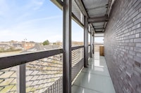Studio bij Strand met Dakterras Zwembad