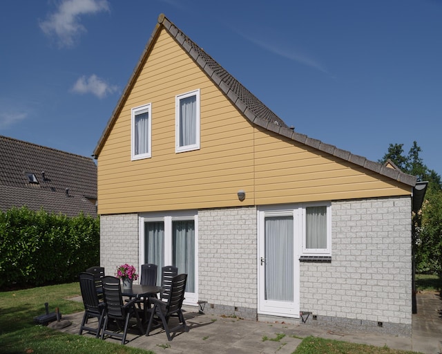 Vakantiehuis in rustige park met tuin