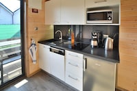 Huisje bij Sianożęty Strand met Sauna