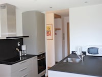 Appartement in Zwitserland met Balkon