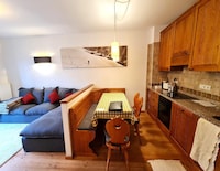 Appartement met balkon en uitzicht op de bergen
