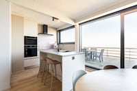 Penthouse am Meer mit Dachterrassenblick
