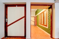 Super  Hotel O CSIR Pappanamcode Formerly Ambadi Guest House