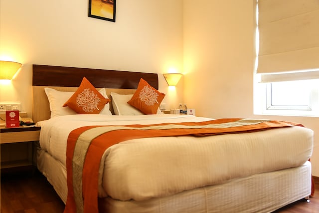 OYO The Centre Point Near Ecr Beach