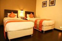 OYO The Centre Point Near Ecr Beach