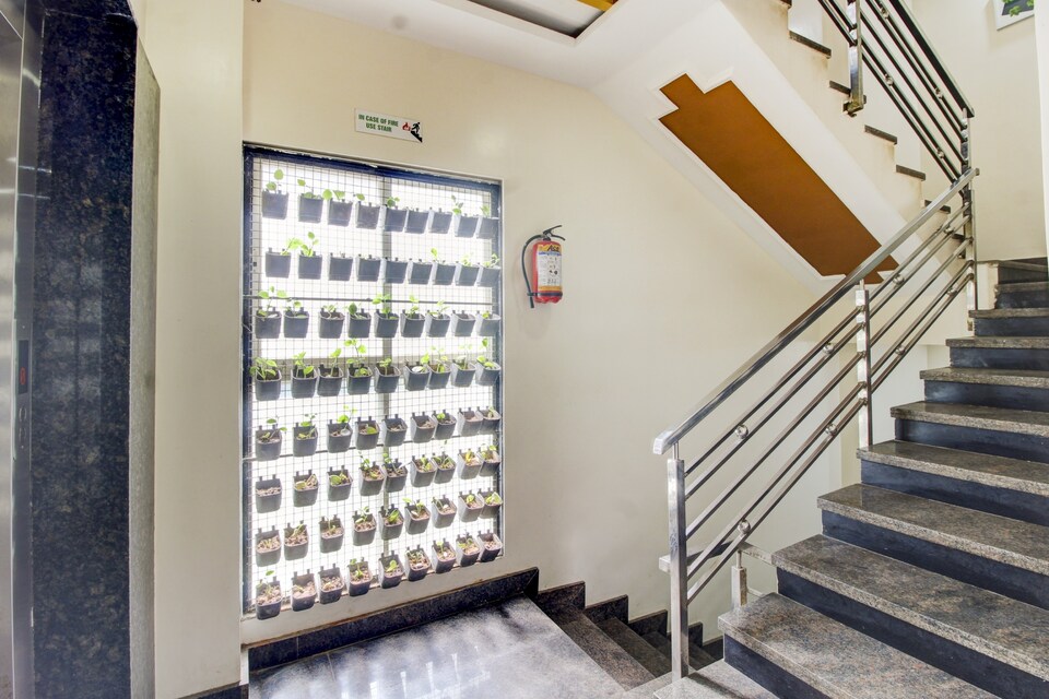 CAPITAL O 74741 Green Woods Premium Suites, Indiranagar Bangalore, Bangalore