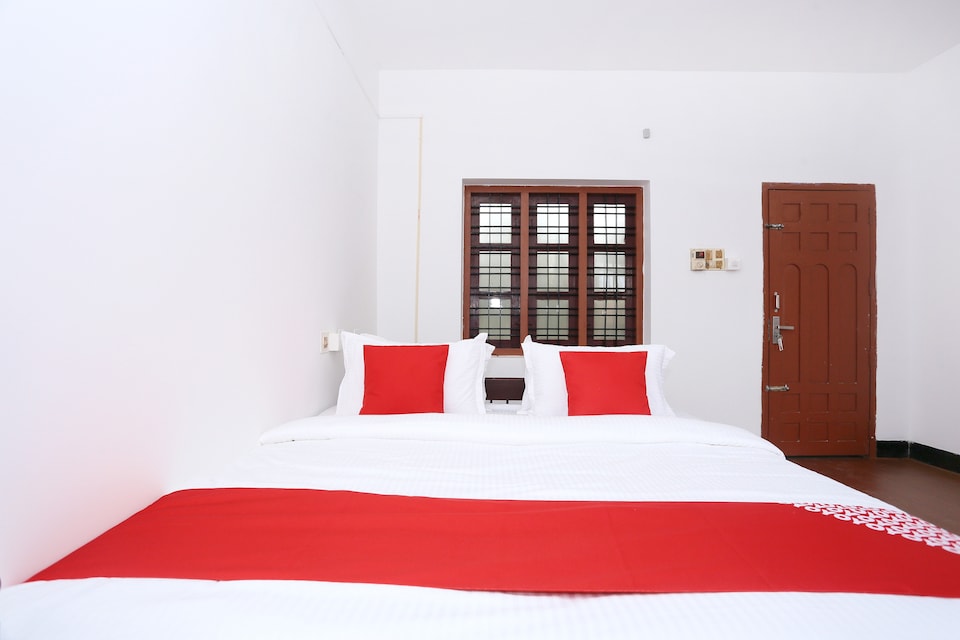 OYO Flagship Kaveri Tourist Home Guruvayur, Guruvayur, Guruvayur