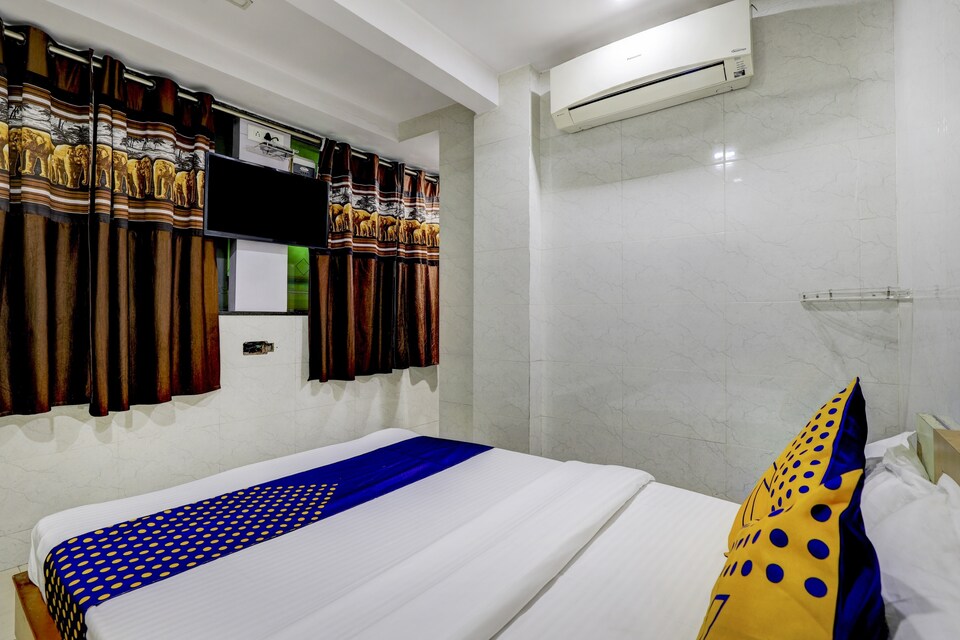 SPOT ON 75928 Kiran Hotel And Guest House, Kadodra Surat, Surat