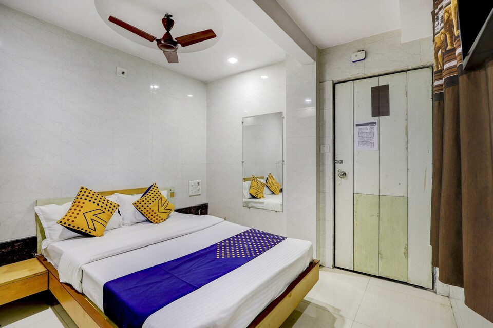 SPOT ON 75928 Kiran Hotel And Guest House, Kadodra Surat, Surat