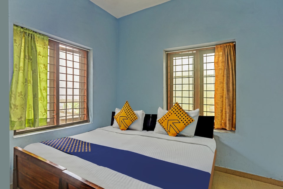 SPOT ON 76469 Mc Lodge, Moovattupuzha, Kochi
