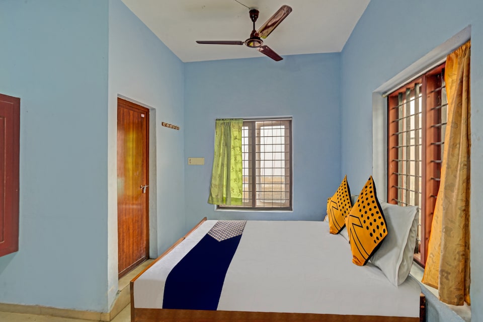 SPOT ON 76469 Mc Lodge, Moovattupuzha, Kochi