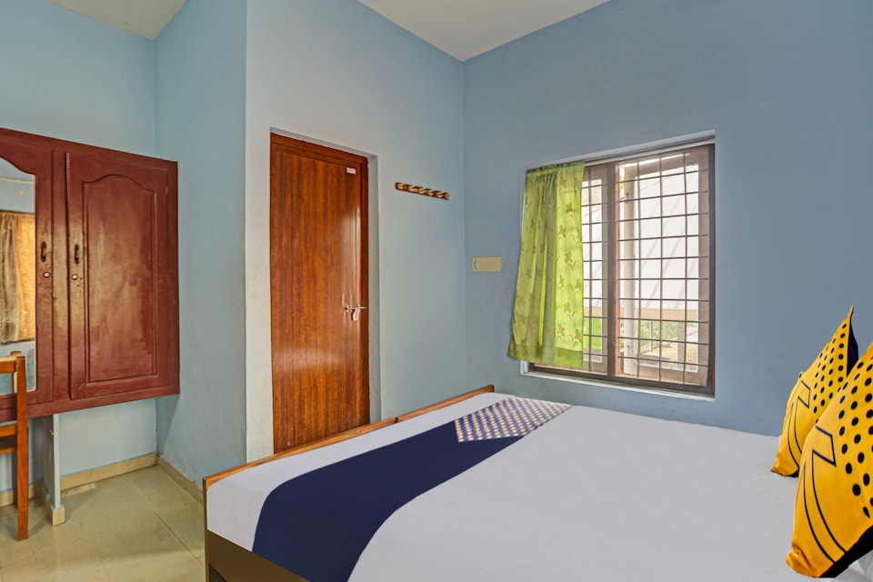 SPOT ON 76469 Mc Lodge, Moovattupuzha, Kochi