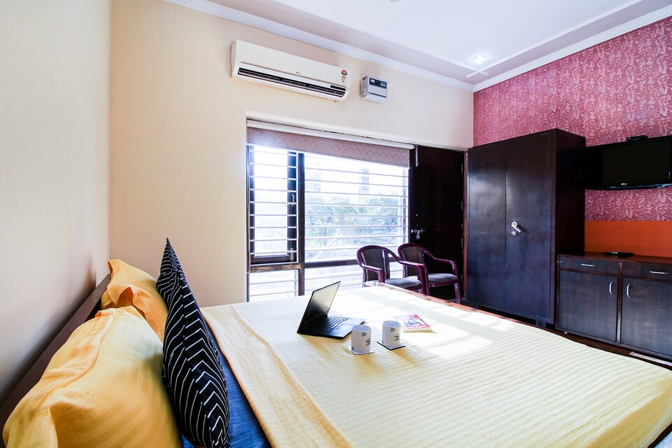 OYO Flagship 77045 New Sunshine Hotel, Golf Course Road, Gurgaon