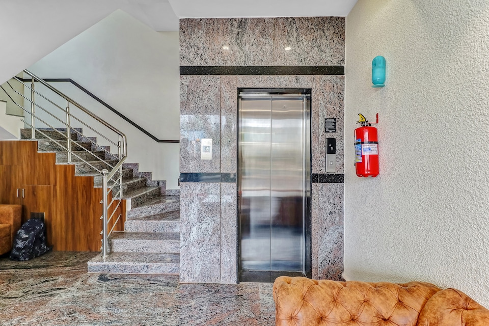 Capital O Safari Rooms Near Snow City, Manyata Bangalore, Bangalore