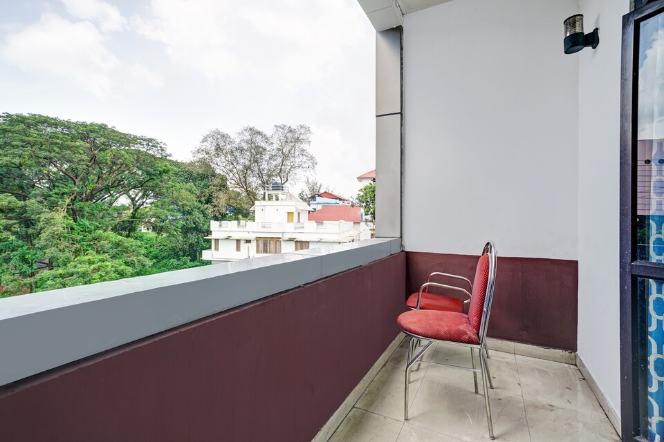 Collection O 82943 Palm Inn Tourist Home, Ankamaly Airport Kochi, Kochi