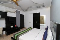 OYO Hotel Cybercity Rooms & Suites Near Aravali Biodiversity Park