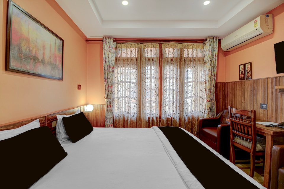 Super Collection O Downtown Hospital Guwahati Formerly Cherry City Cottage, Six Mile Guwahati, Guwahati