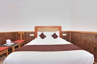 Capital O Hotel Rain Forest
