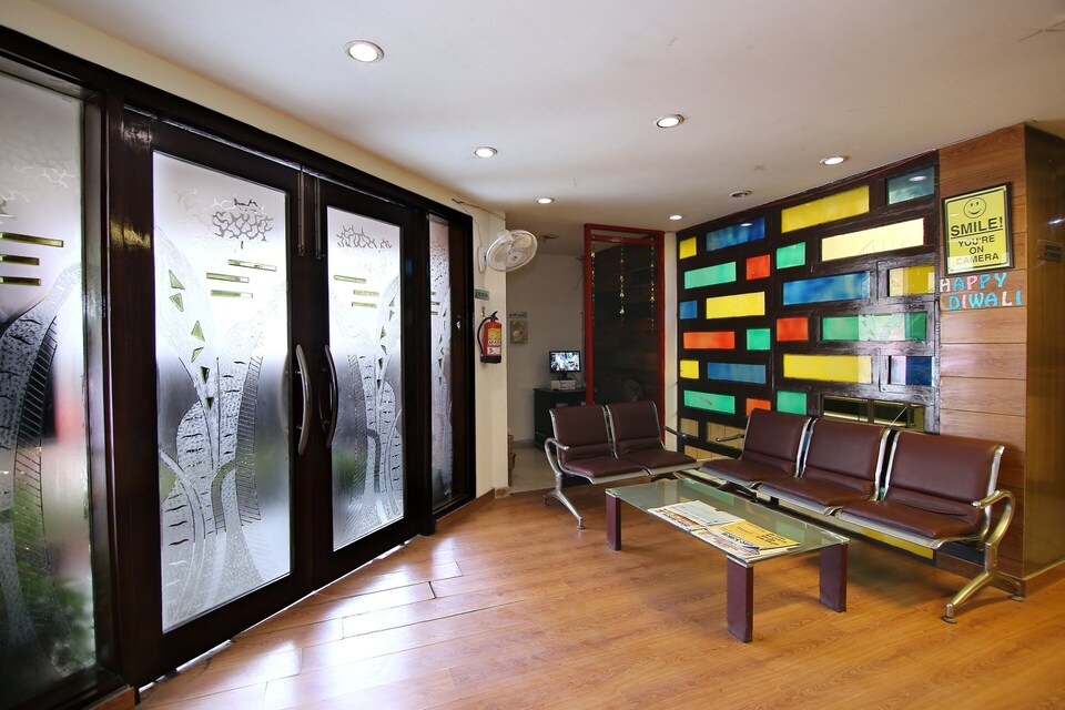 Capital O Hotel Sarthi Near ISKCON Temple Noida, Noida City Metro, Noida