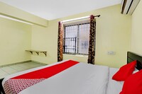 OYO Flagship 83515 Magizh Hotel Rooms