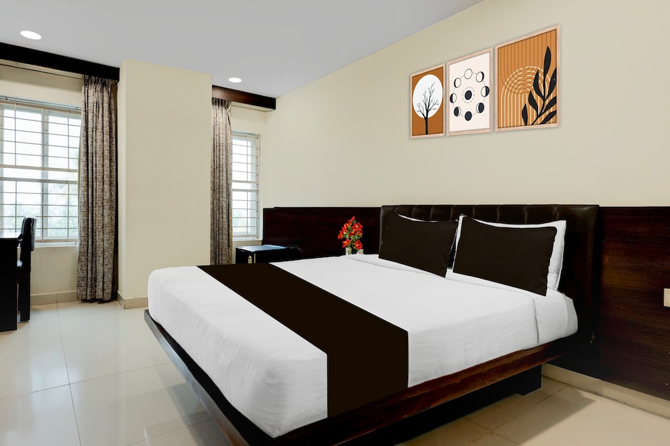 Super Townhouse Oak Vijayawada Formerly Madhuvan Grand, Ramavarappadu Ring Road Vijayawada, Vijayawada