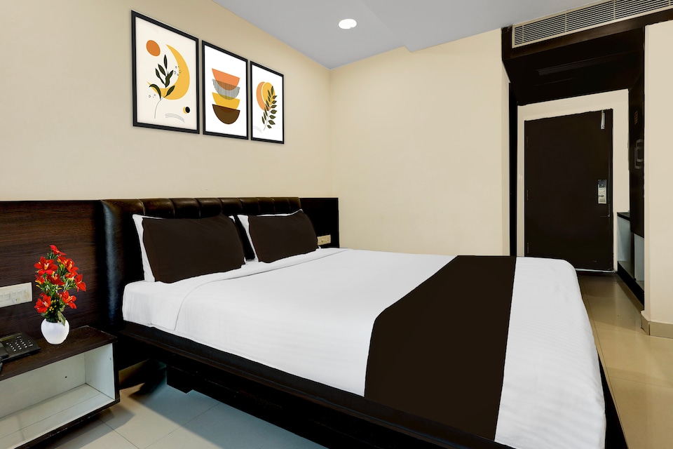 Super Townhouse Oak Vijayawada Formerly Madhuvan Grand, Ramavarappadu Ring Road Vijayawada, Vijayawada