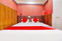 OYO Dvaraka Inn Near Sri Amruth Chithra Mandira