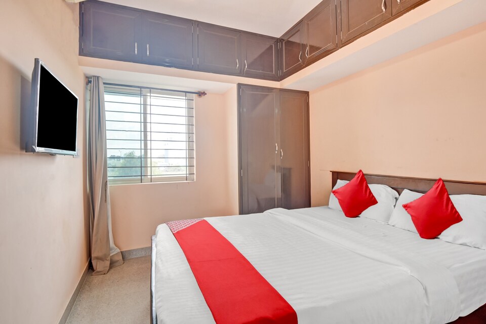 OYO 84336 Nandi Suite, Airport Road Bangalore, Bangalore