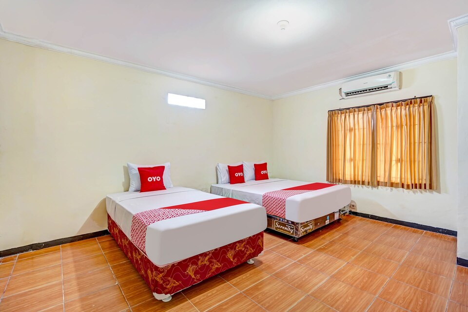 OYO Flagship 90899 Comfitel Siwalankerto AA6, Wonocolo, Surabaya