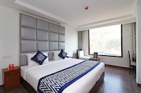 OYO The K Hotel Near Ambience Mall