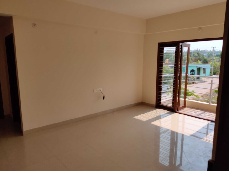 Capital O HOME 89436 Rr Residency , Airport Road Bangalore, Bangalore