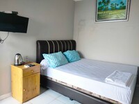 EXPRESS O 91277 Atiq Homestay Syariah