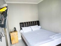 EXPRESS O 91277 Atiq Homestay Syariah