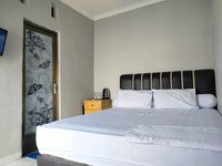 EXPRESS O 91277 Atiq Homestay Syariah