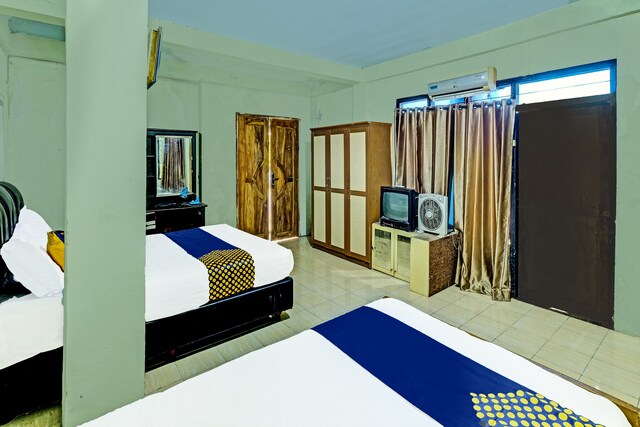 SPOT ON 91540 Ukuh Guesthouse