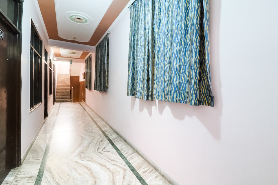 Hotel O Bhagirathi Palace Ganga Beach, Laxman Jhoola Rishikesh, Rishikesh