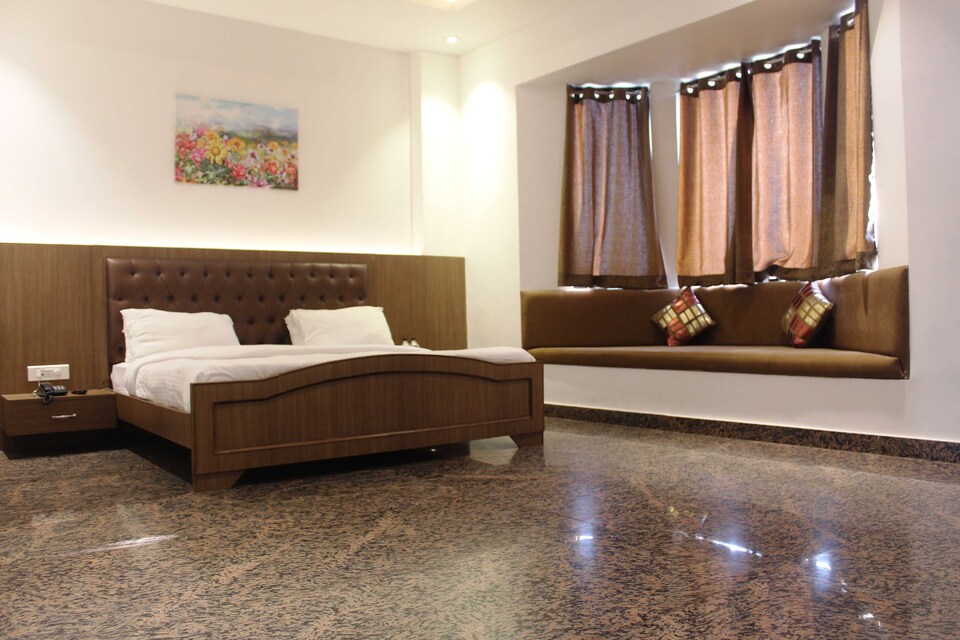 Collection O 703030 Blue Sapphire, Ramnagar City, Corbett-Ramnagar